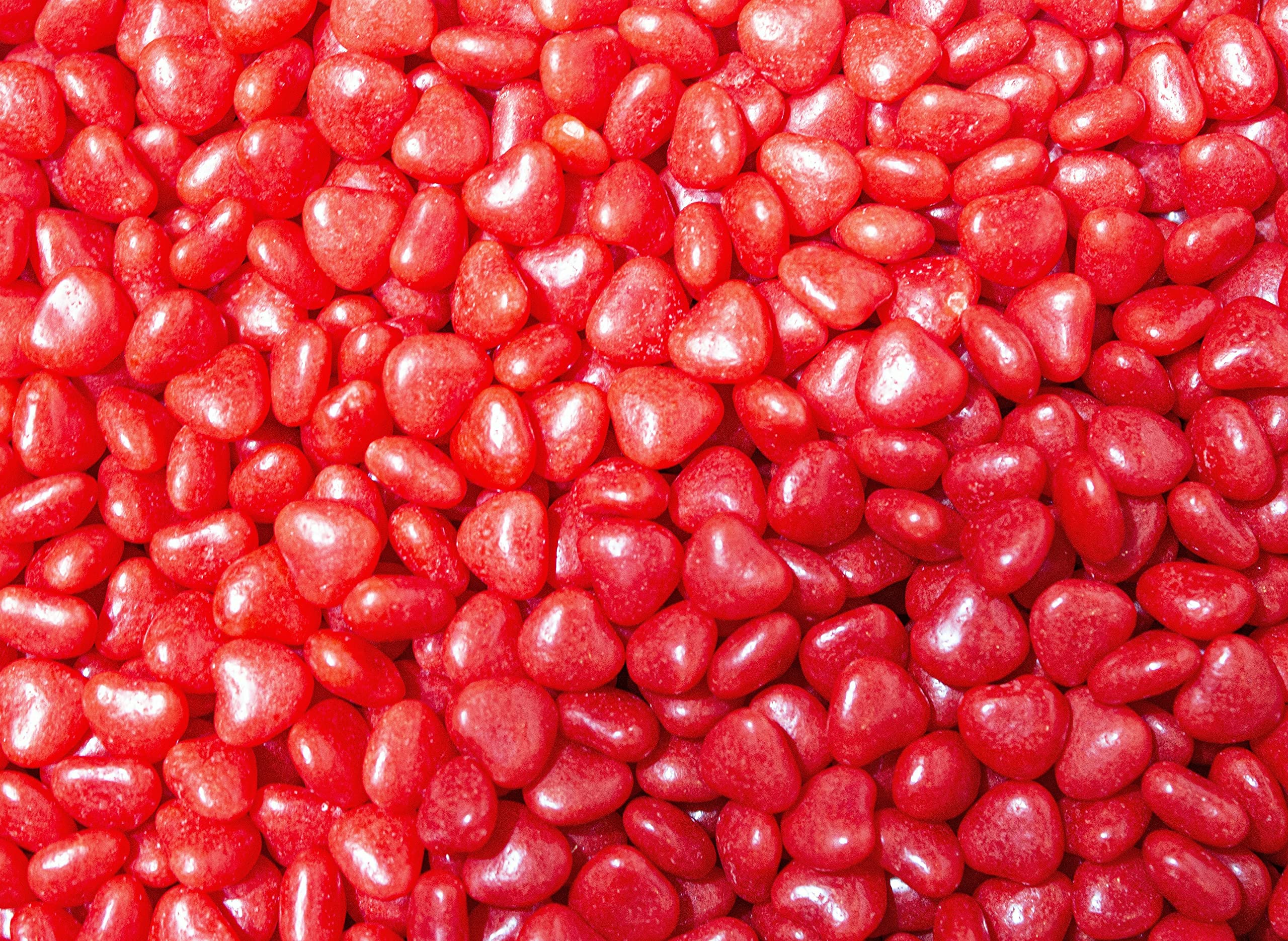 Bulk bag of DM Sweets Cinnamon Hearts ideal for vending machines and displays.