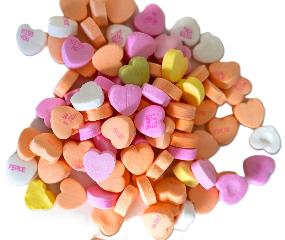 DM Sweets hearts with printed messages invite sharing and thoughtful notes