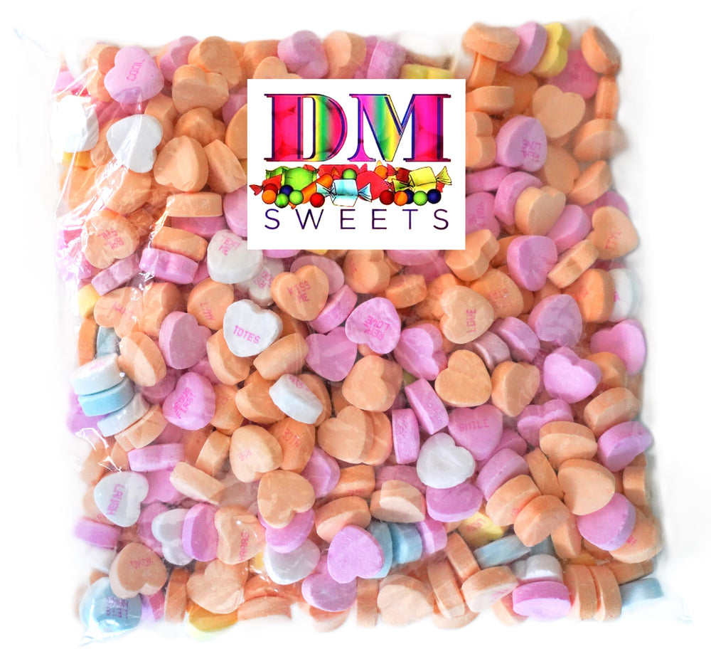 DM Sweets conversation hearts pastel colors create a playful Valentine mood