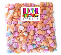 DM Sweets conversation hearts pastel colors create a playful Valentine mood