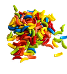 Close-up of DM Sweets Crazy Banana Candy showing crunchy texture and vibrant colors.