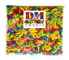 DM Sweets Crazy Banana Candy in multi-color 1 lb, ideal for party buffets.
