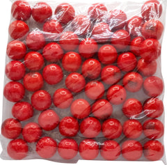 DM Sweets hot-spicy cinnamon gumballs, close-up shows 1 inch diameter bite