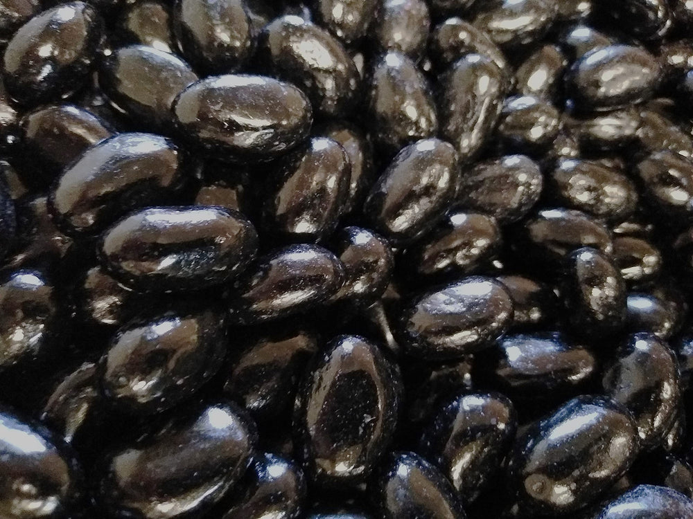 DM Sweets jumbo licorice beans in bulk bag, cost-effective party snack.