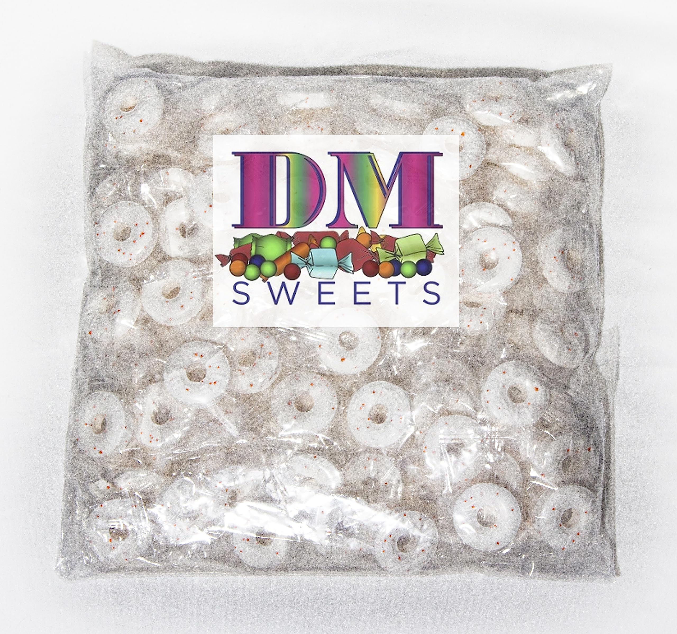 DM Sweets Orange Mints closeup of individually wrapped hard candy for easy snacking.
