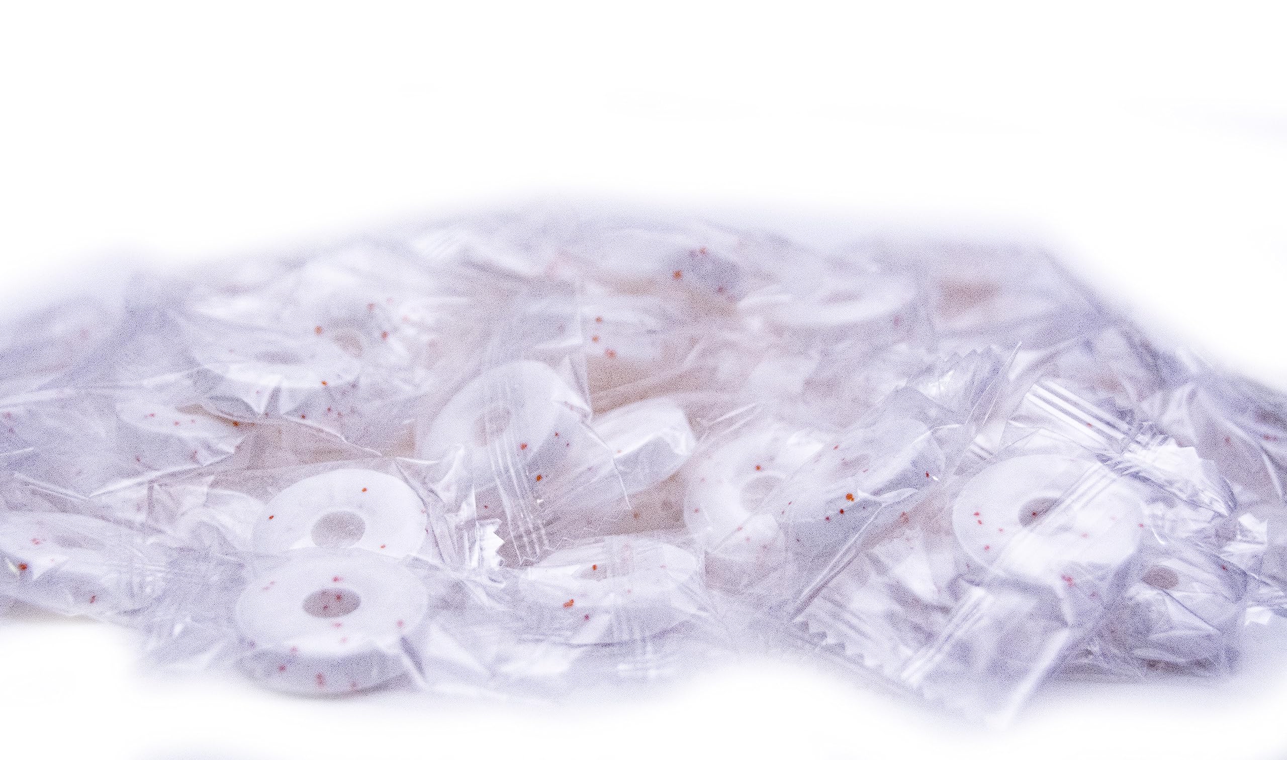 DM Sweets Orange Mints packaged for sharing, perfect for gatherings and party favors.