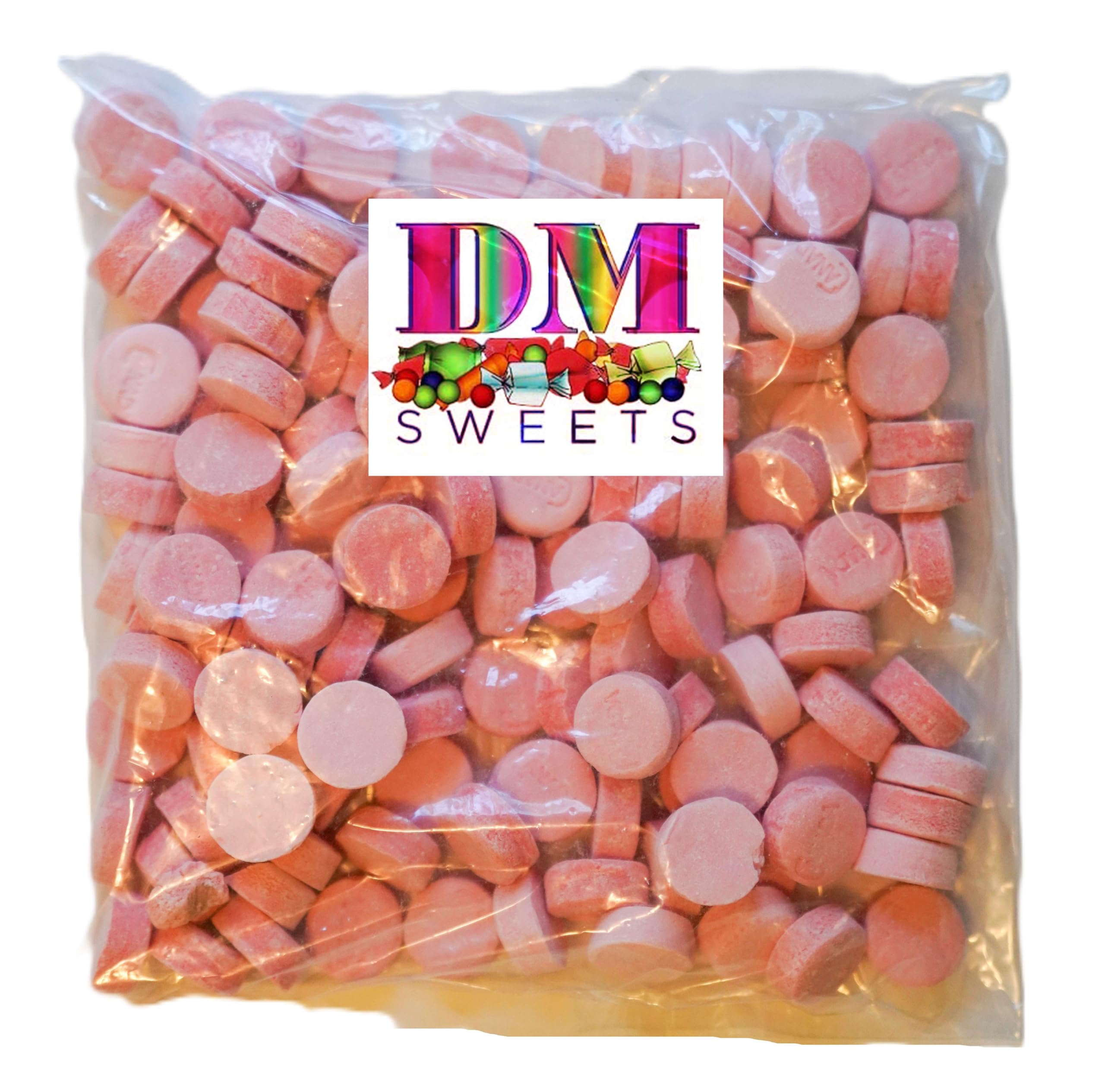 Close-up of pink wintergreen lozenge mint showing bright hue and crisp texture.