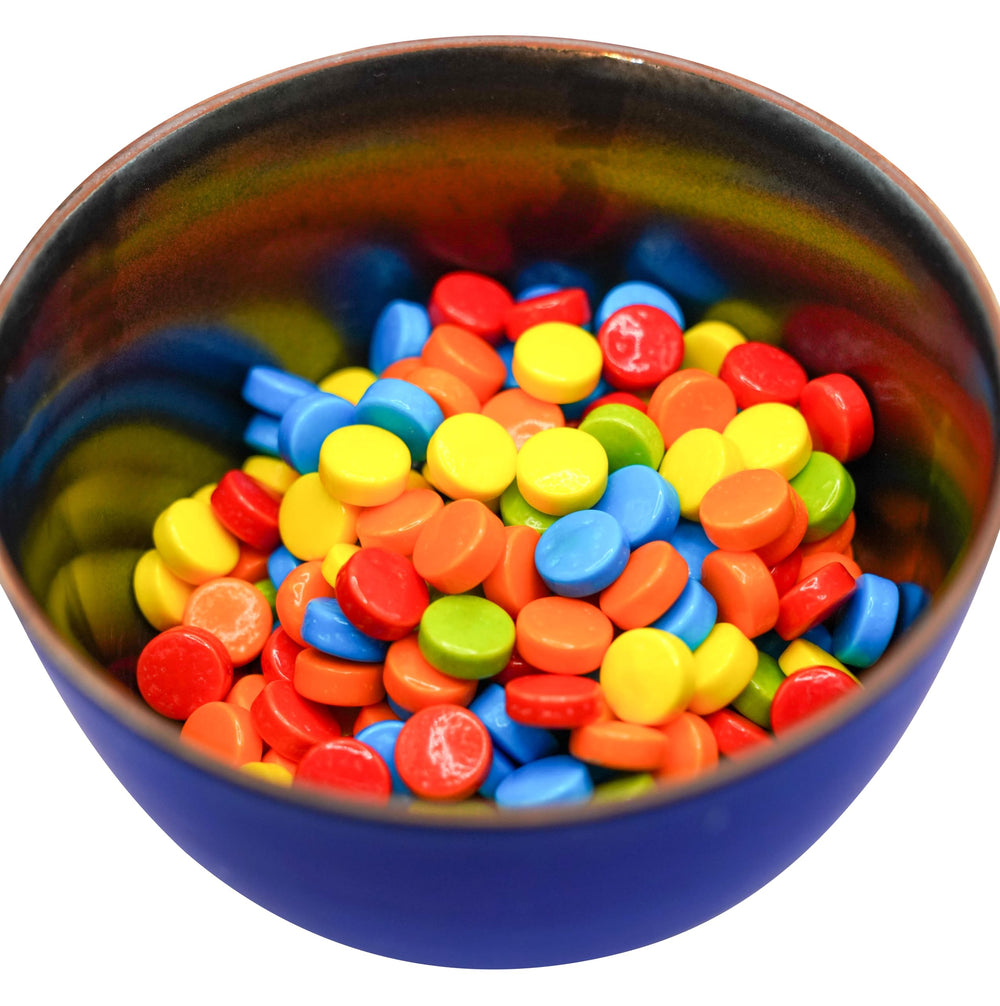 DM Sweets rainbow pucker candy in vending machine setup demonstrates quick snack.