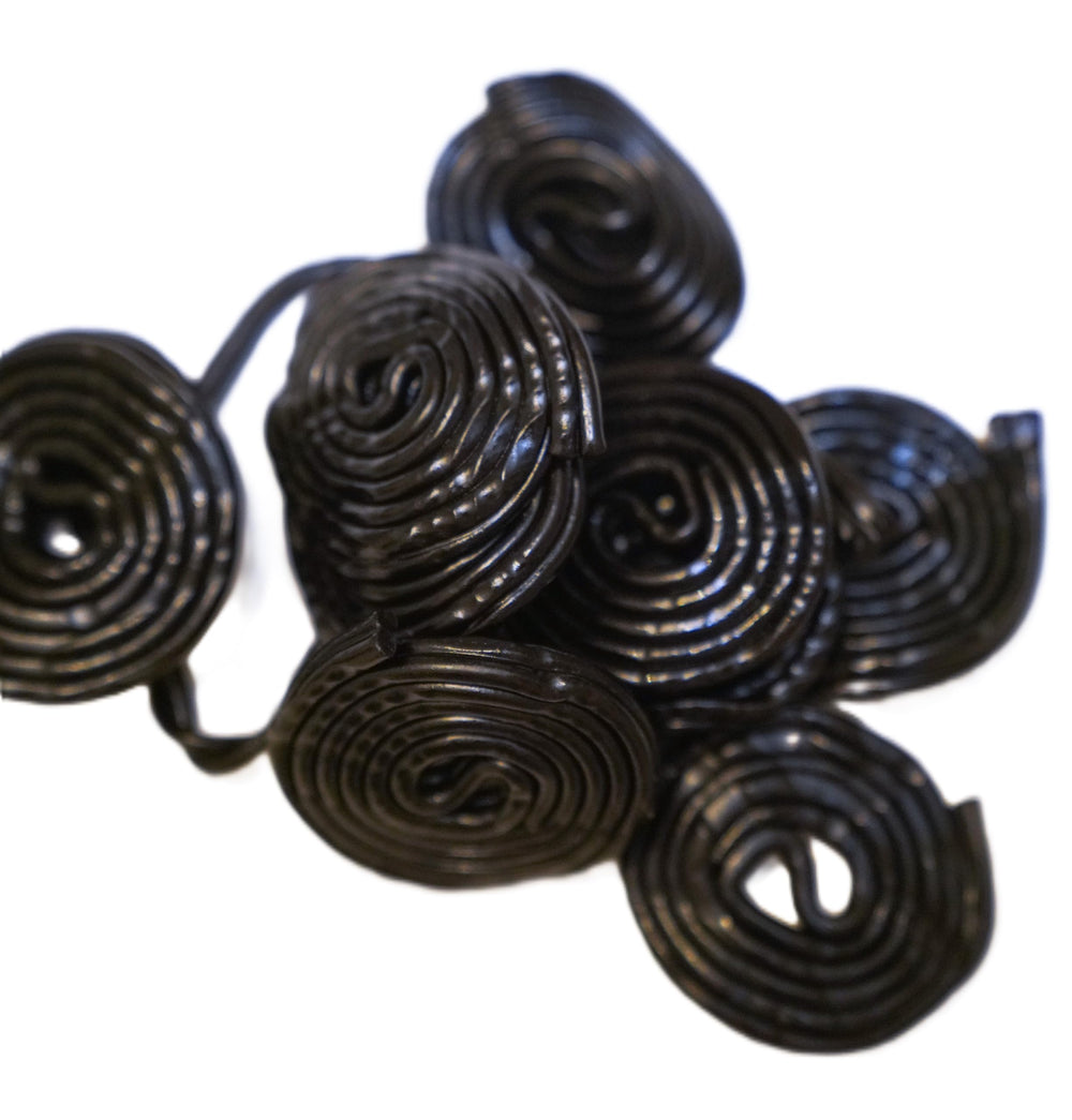 DM Sweets Black Licorice Wheels stacked neatly for easy portioning