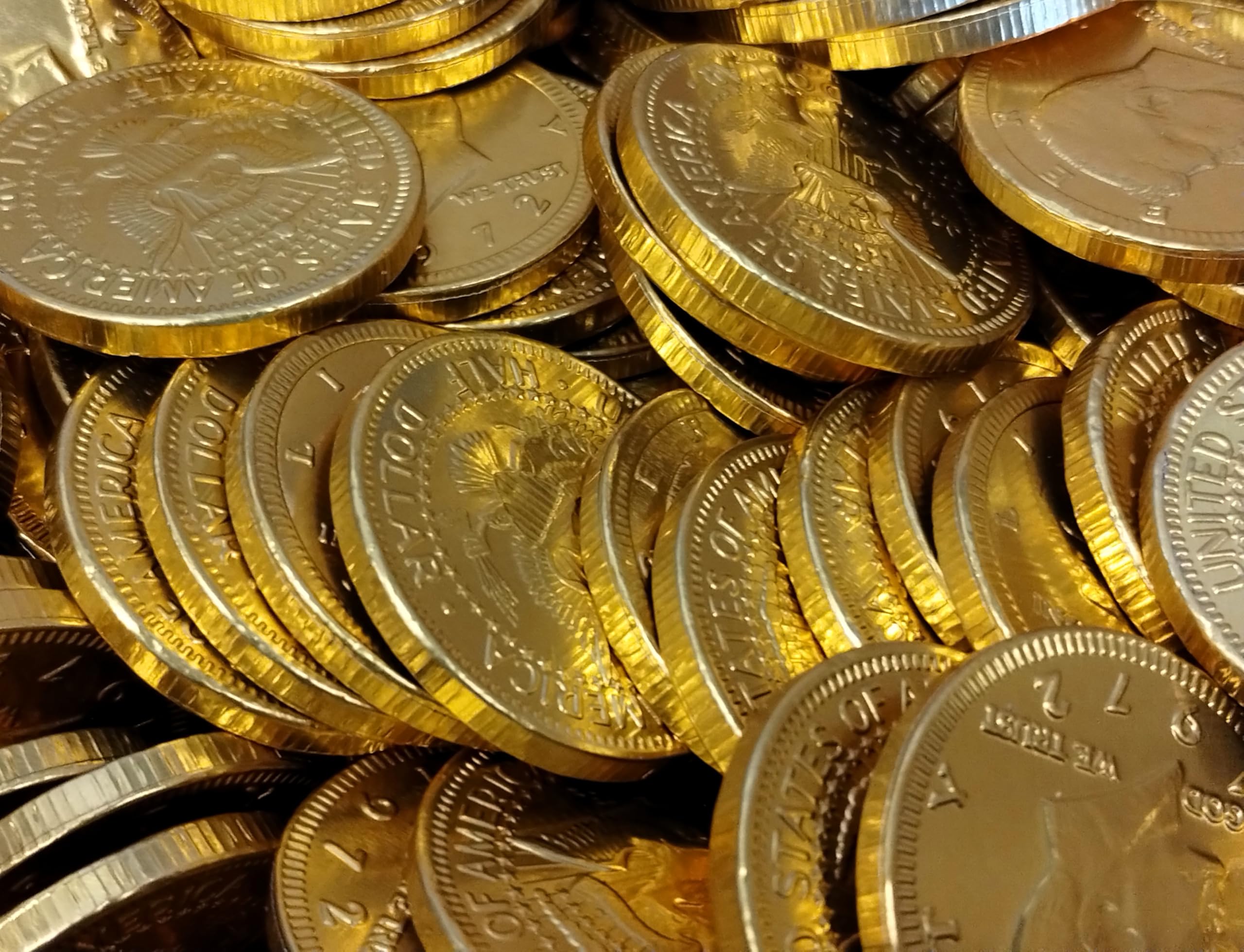 DM Sweets milk chocolate coins in gold foil packaging, ideal for gifting.
