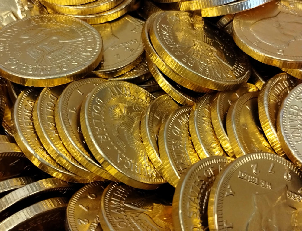 DM Sweets milk chocolate coins in gold foil packaging, ideal for gifting.