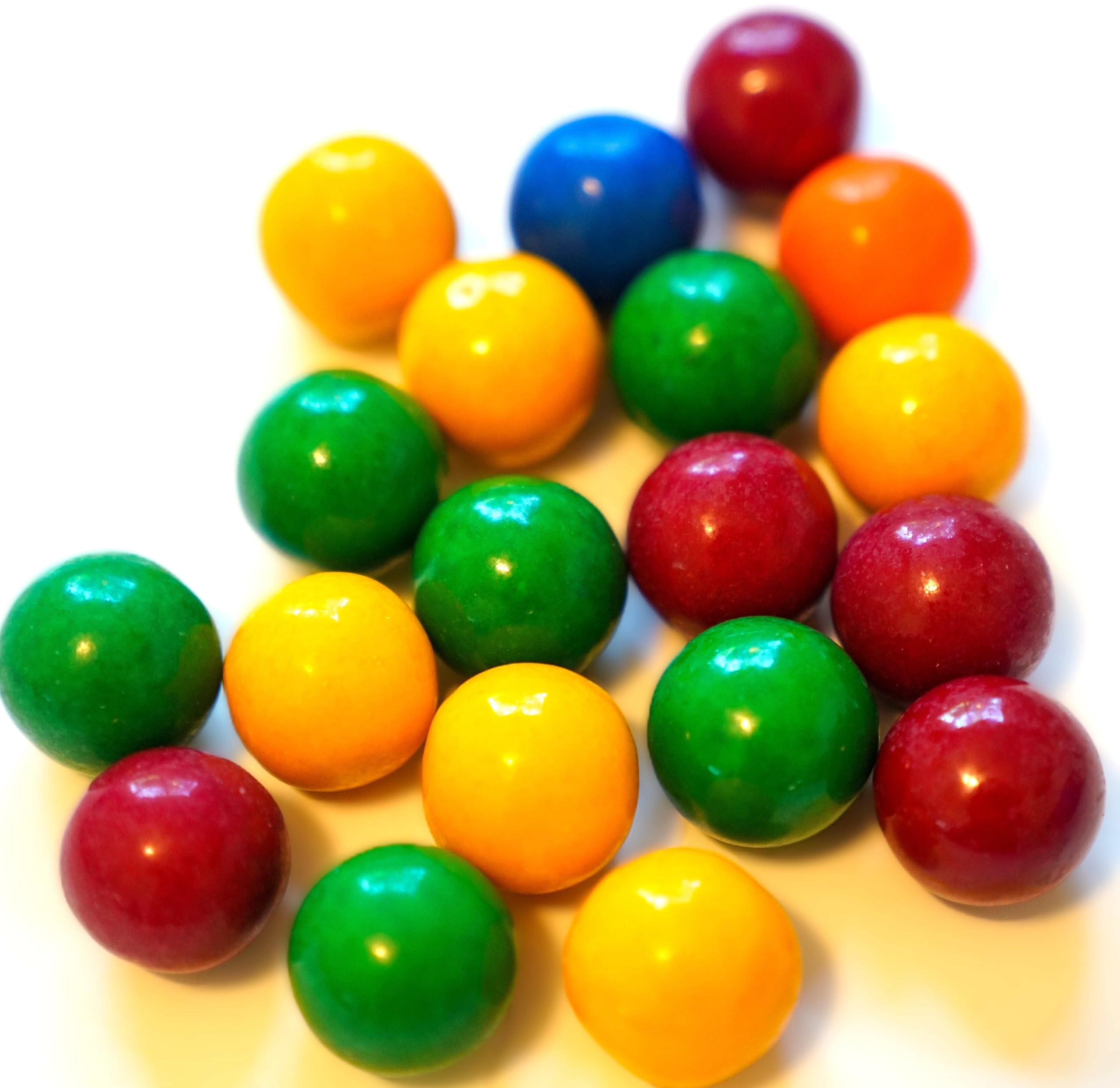 DM Sweets orange flavor gumballs with tangy powder inside—burst of citrus