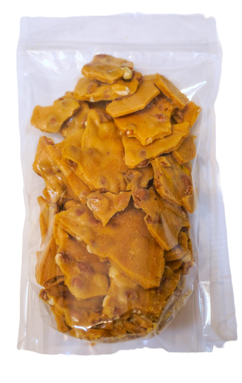 DM Sweets peanut brittle closeup-peanuts with glossy coating