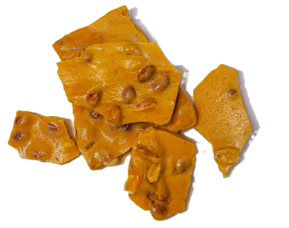 DM Sweets Peanut Brittle served in a decorative bowl for sharing moments