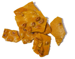 DM Sweets Peanut Brittle served in a decorative bowl for sharing moments