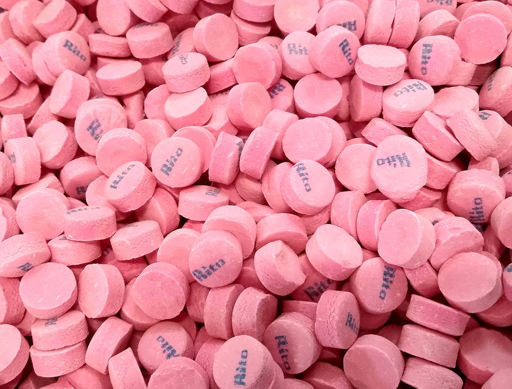 DM Sweets Pink Wintergreen lozenge on kitchen counter for snacking
