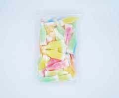 Nik-L-Nip fruity flavors display blue raspberry, cherry, orange, lemon, green