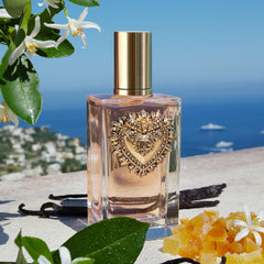 Outer packaging with gold accents evoking devotion and elegance.