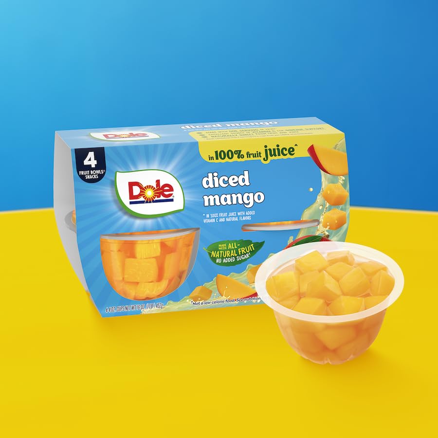 Close-up of Dole mango chunks in vibrant, juicy slices.