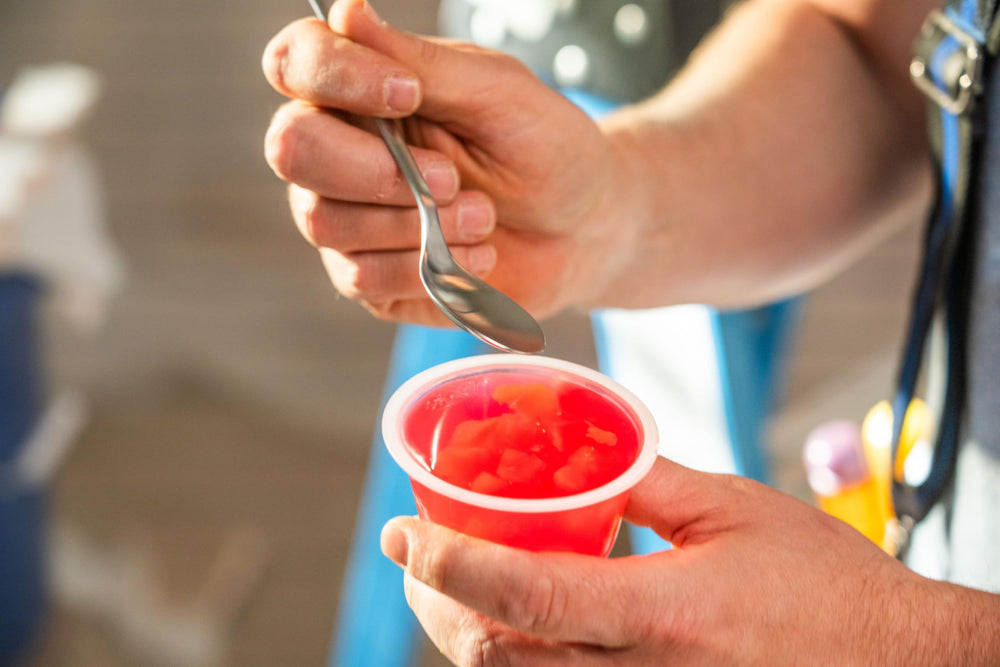 DOLE Fruit Bowls peaches in strawberry gel, portable and mess-free snack.