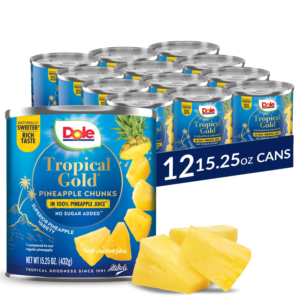 Dole Tropical Gold pineapple chunks in juice close-up showing vibrant pieces.