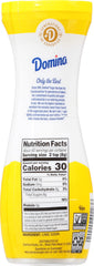 Domino Quick Dissolve sugar pack of three on kitchen shelf.