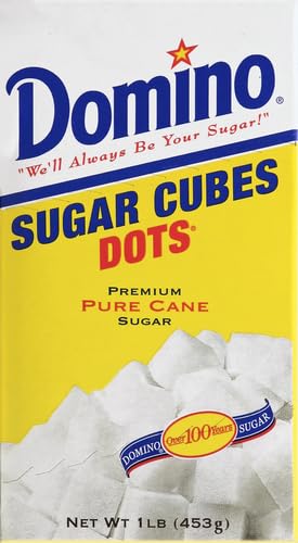 Domino Sugar 1lb teaspoon measure shows precise sweetness for beverages.
