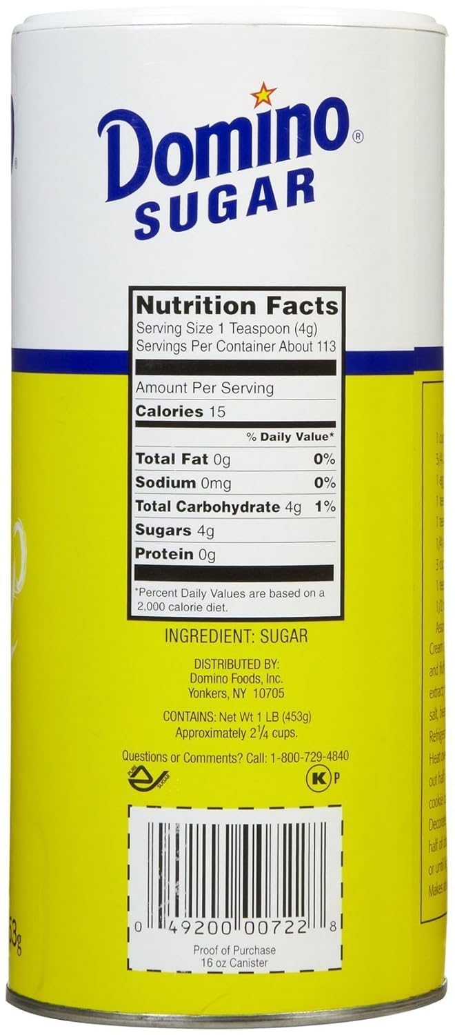 Domino Sugar Granulated Canister 1 lb pour demonstrates convenient dispensing.