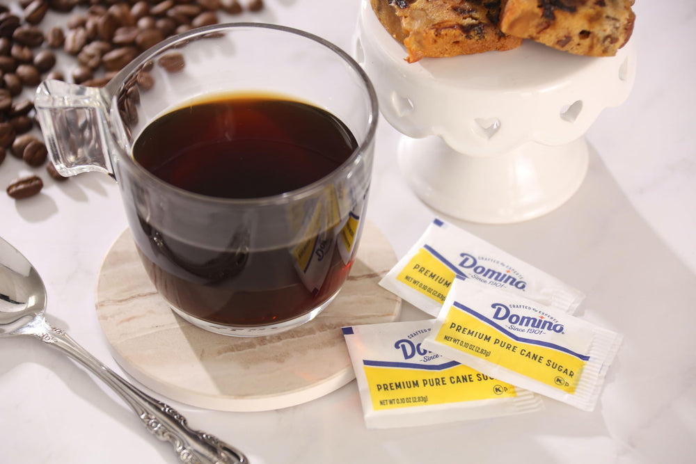 Bulk 400-count Domino sugar packets for busy cafes