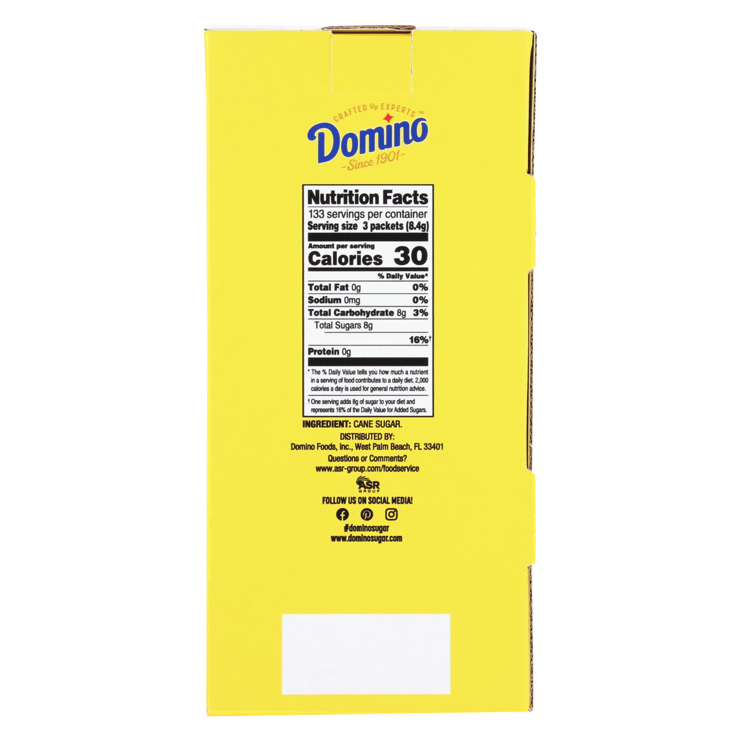 Domino sugar packets at a coffee station ready for self-serve
