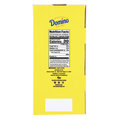 Domino sugar packets at a coffee station ready for self-serve