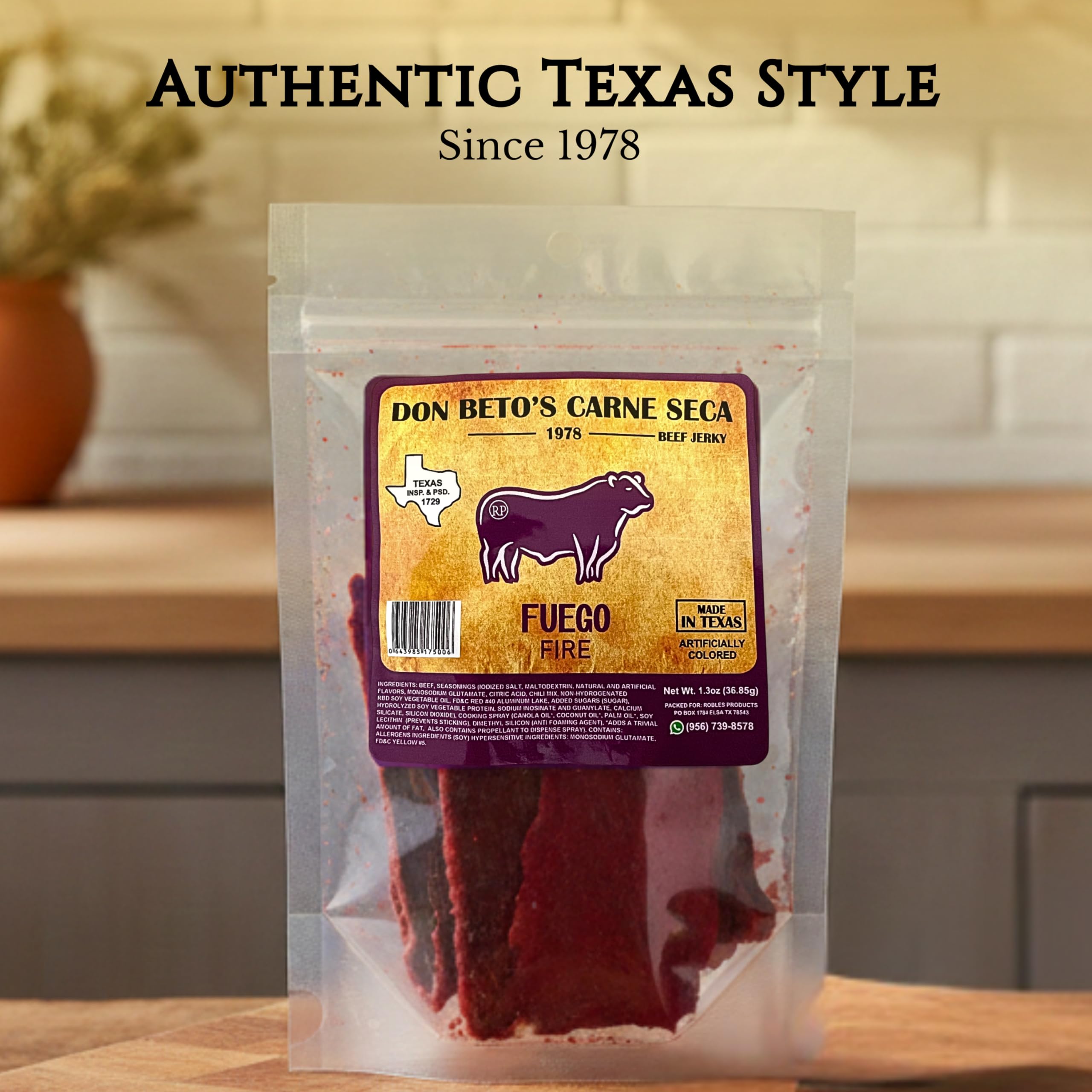 Don Beto's Carne Seca Fuego beef jerky closeup shows bold red spice and texture.