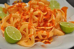 Don Turinos Duritos wheels in frying pan—quick prep for fresh crunch.