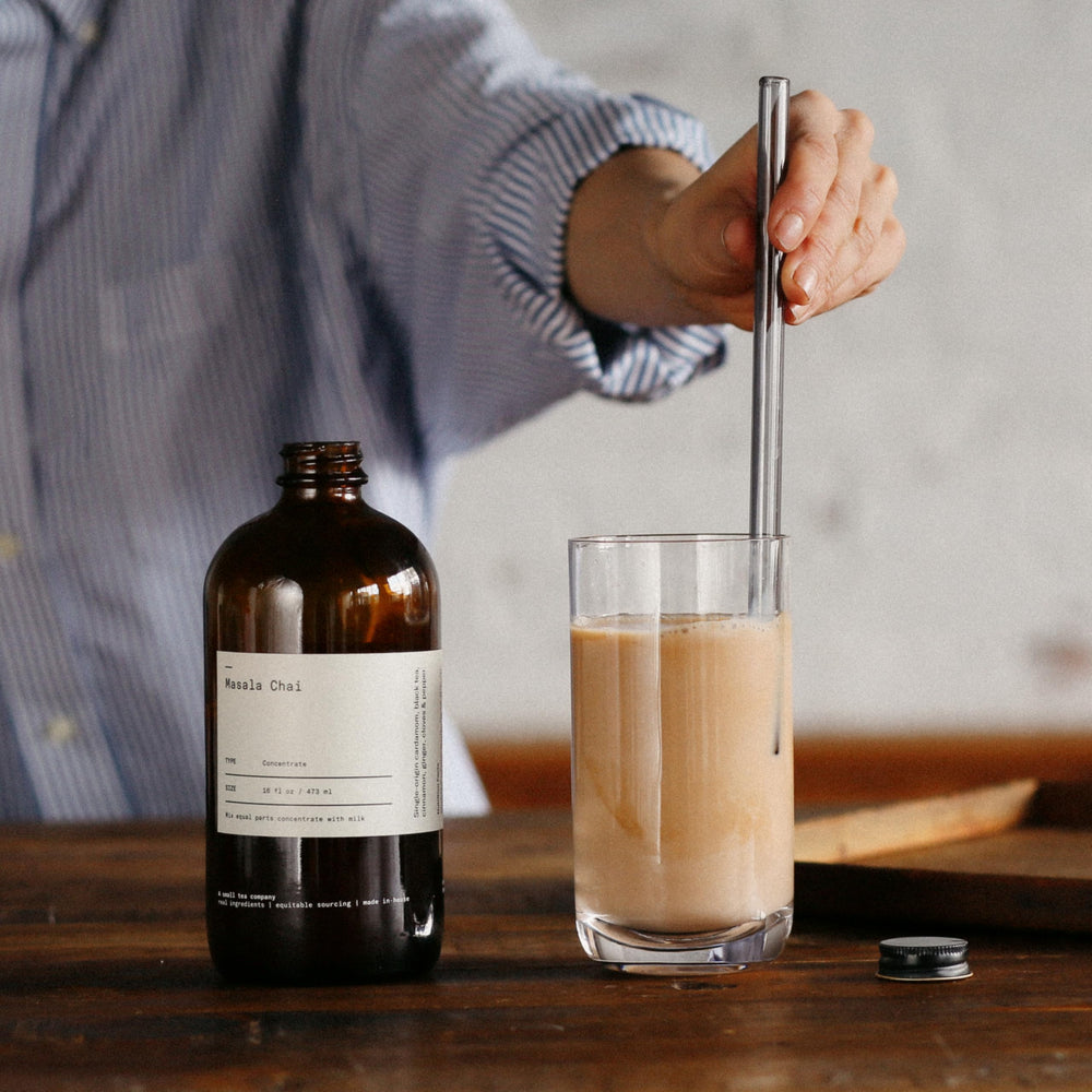 DONA chai pour into milk image suggests latte-ready versatility.