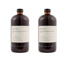 DONA Original Masala chai concentrate bottle shows bold spices for cafe-style brews.