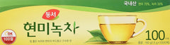 Dongsuh Brown Rice Green Tea bag in cup with smooth aroma for daily ritual.