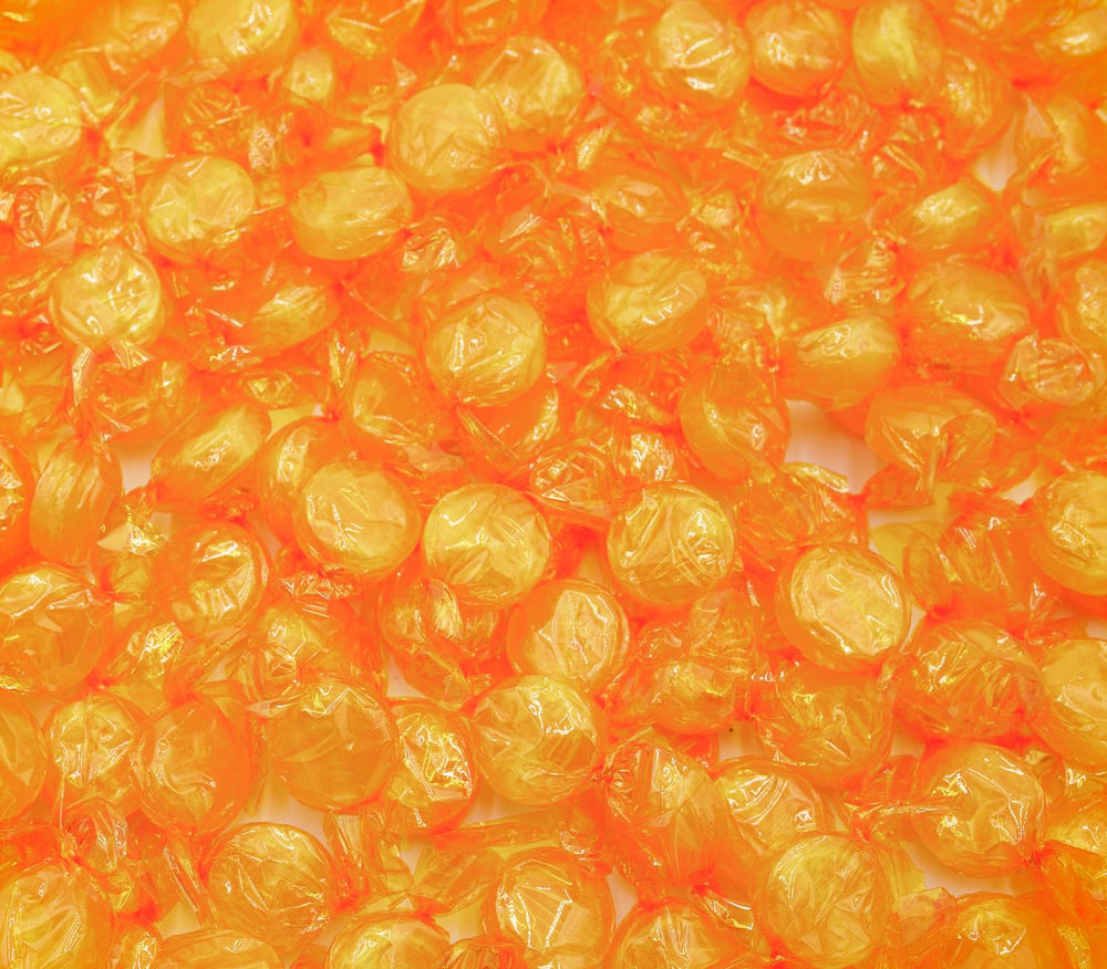 Donty-Tonty butterscotch discs bulk bag shows golden color for sharing