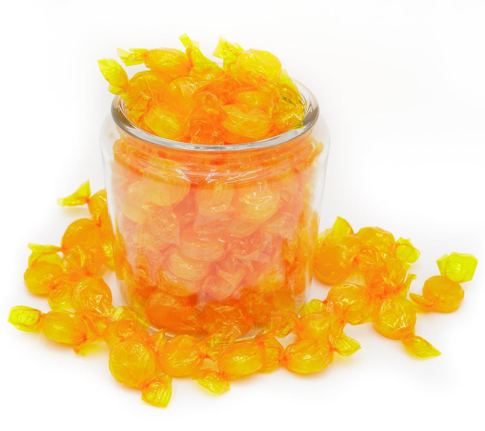 Donty-Tonty butterscotch discs in clear packaging for easy display and storage