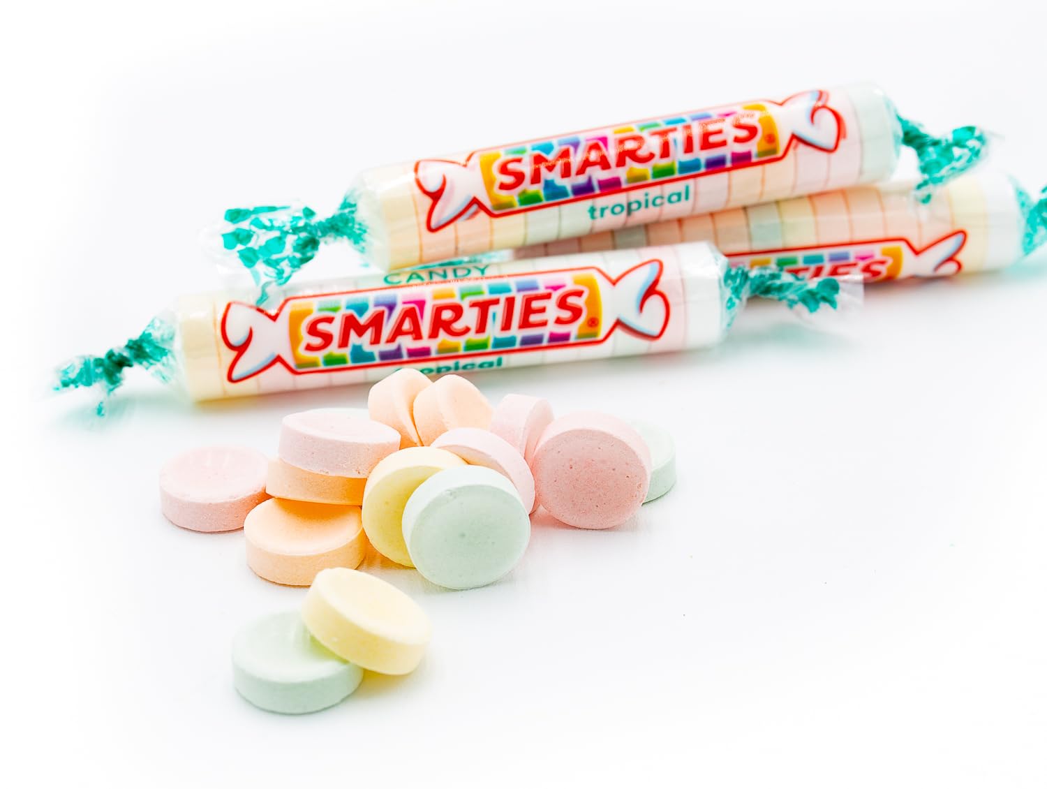 Donty-Tonty Tropical Candy Rolls bulk party table setup for gatherings.