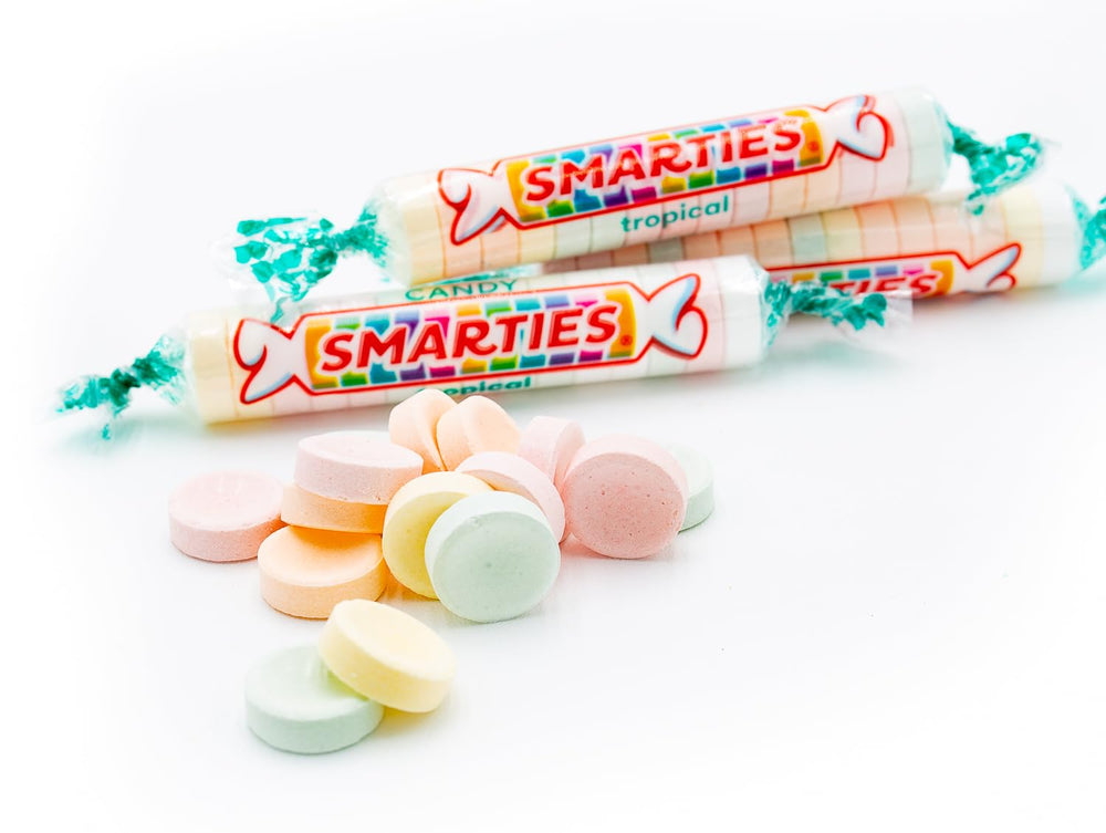 Donty-Tonty Tropical Candy Rolls bulk party table setup for gatherings.