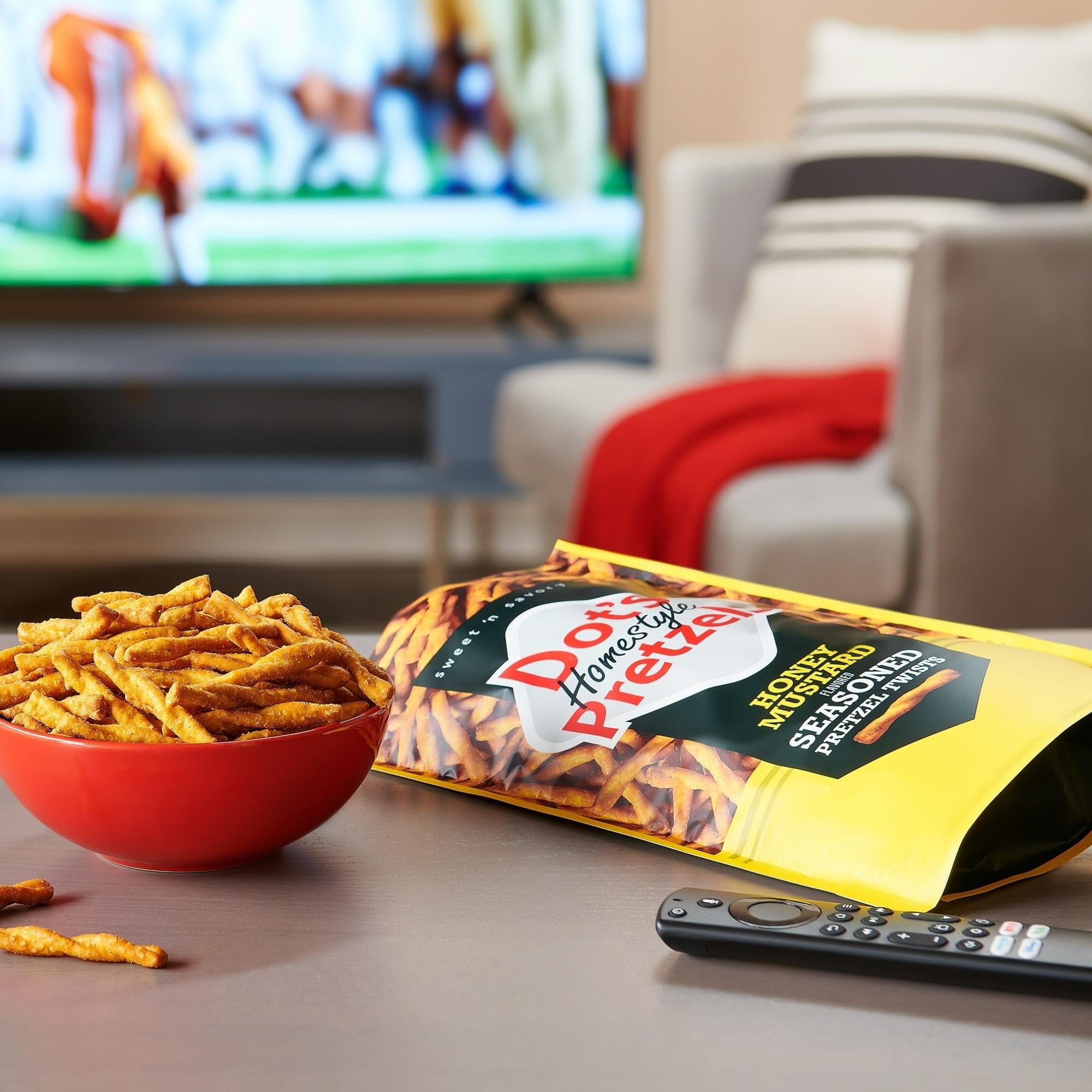 Dot's Honey Mustard pretzels in a lunchbox, a kid-friendly snack.