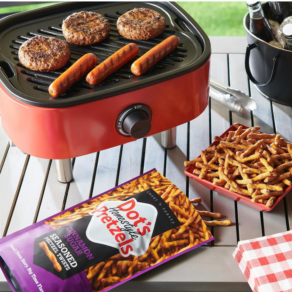 Crumbled Dot's Pretzels Cinnamon Sugar Twists used to crust a savory dish.