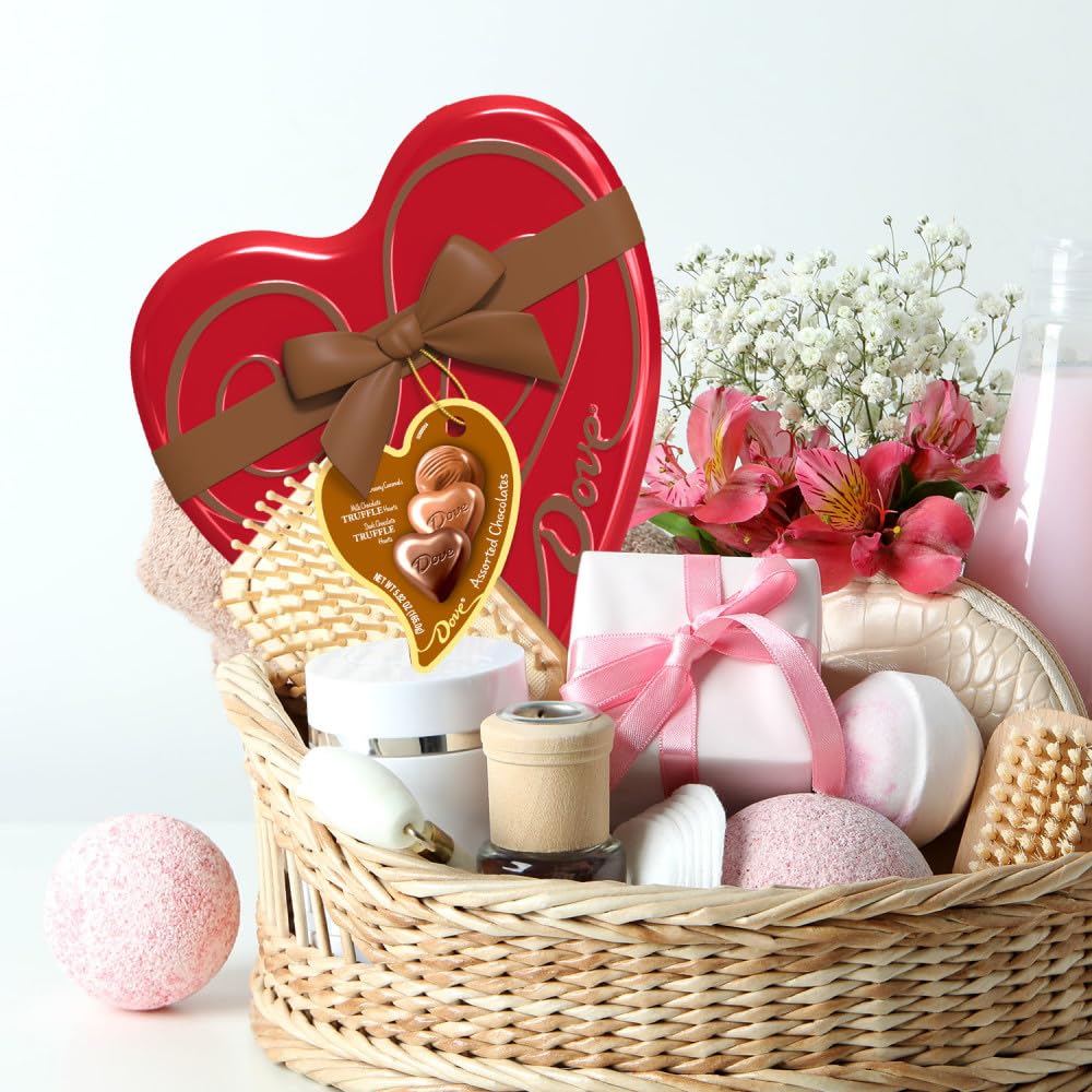DOVE open-heart tin reveals smooth chocolates and cocoa aroma.