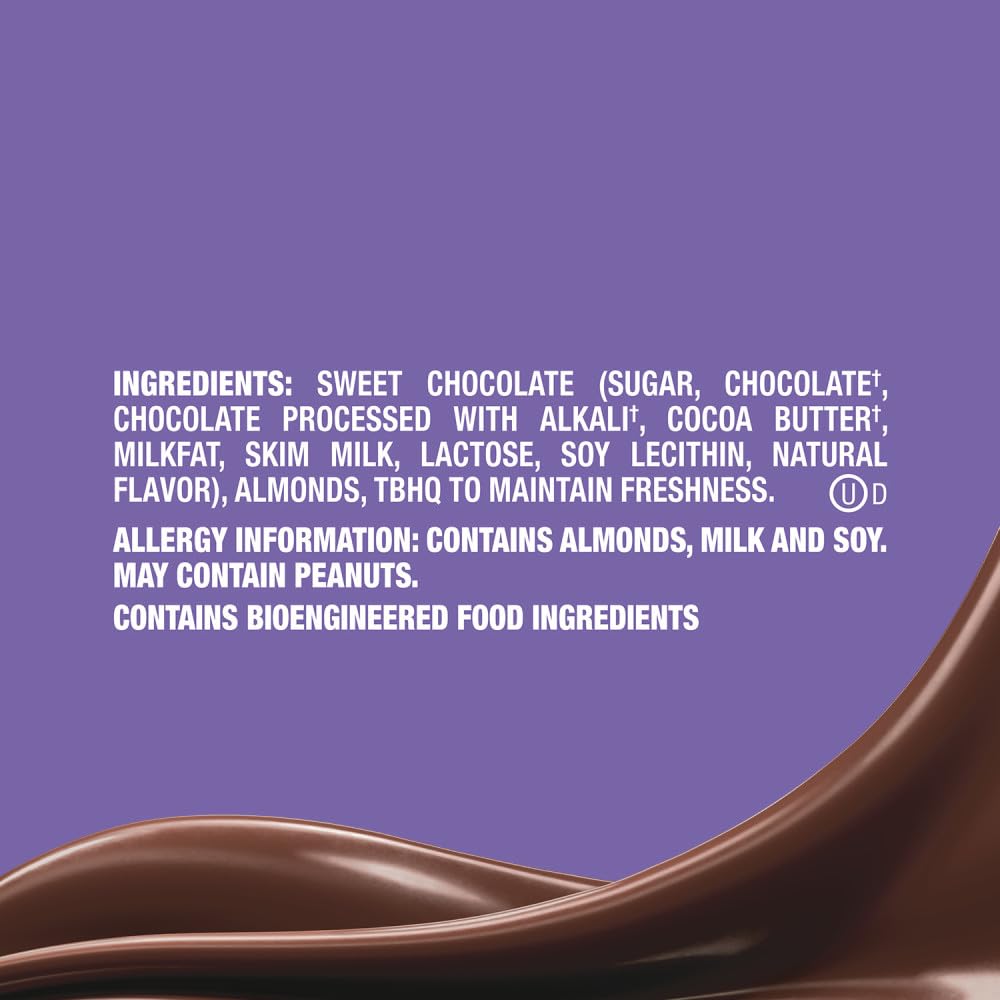 Silky dark chocolate with almond crunch close-up.