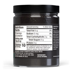 Dr. Mercola Solspring black garlic purée spread on toast adds creamy, savory depth.