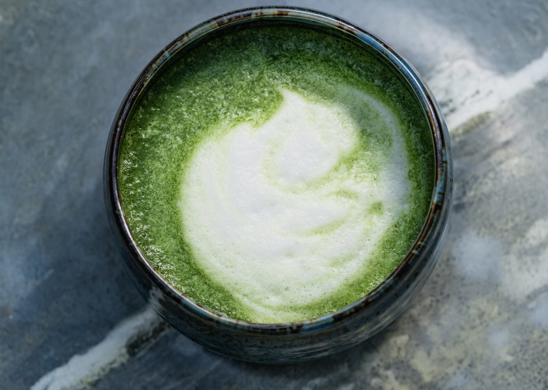 Tea whisk with Matcha Kari bowl ready for traditional preparation