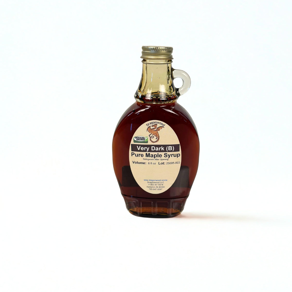 Dragonwood Pure Maple Syrup, very dark bottle pour, delivers bold maple flavor for cooking and toppings.