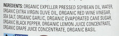 Drew's All Natural Organic Italian Dressing ingredients close-up showing herbs and oils.