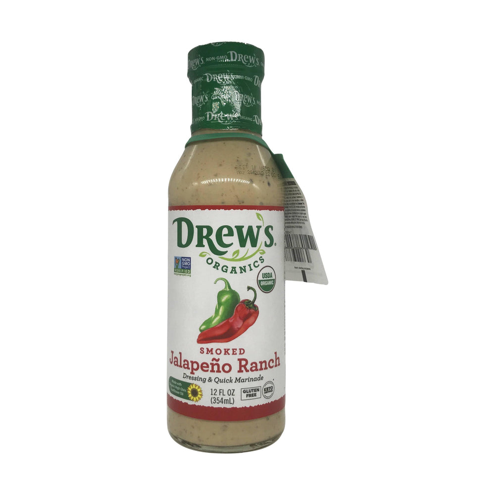 Drew's All Natural Organic Smoked Jalapeño Ranch Dressing bottle pouring over greens