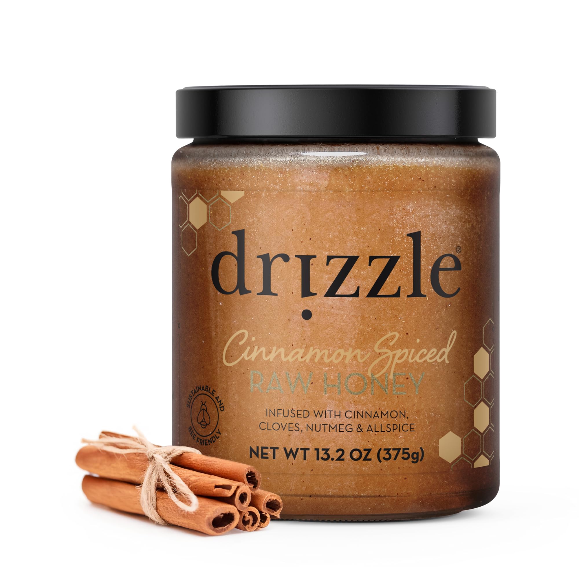 DRIZZLE Cinnamon Spiced Raw Honey bottle ready for tea and toast